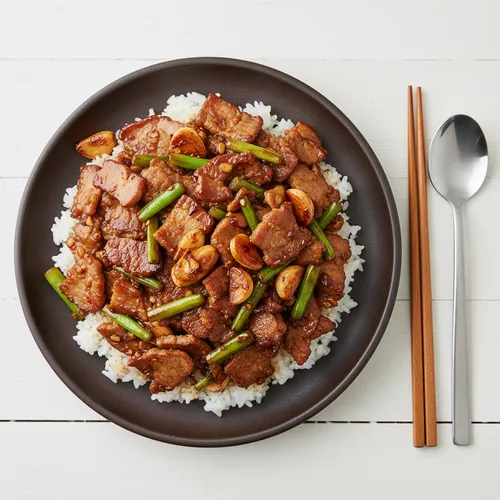 中華風にんにくの芽と豚バラ肉の炒め物